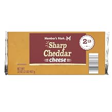 Sharp Cheddar Cheese Block, Sharp cheddar has a bite to it, with an acidic zing that is evocative of the tang of citrus fruits like lemons and oranges, 2 lbs.